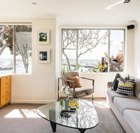 Waterfront Apartment Brimming with Inspirational Artwork - Accommodation Adelaide