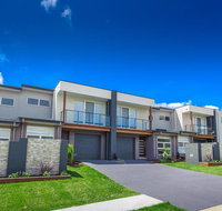 Escape At Nobbys Executive Townhouse 1 74 Pacific Drive - Accommodation Adelaide