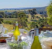 The Farmhouse - grape vines and rolling green hills - Accommodation Adelaide